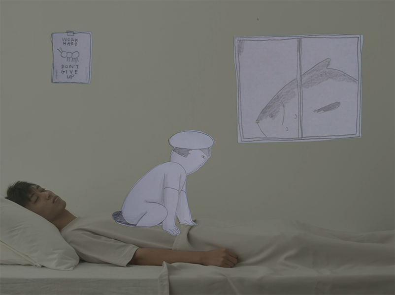 The man in a cream shirt sleeps on a bed as the tiny man in the beret climbs out of a hole in his stomach. A large fish swims by the window.